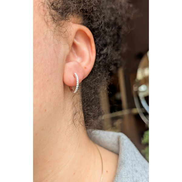 10 mm x 11 mm Oval Huggie Hoop Earrings Image 2 Conti Jewelers Endwell, NY