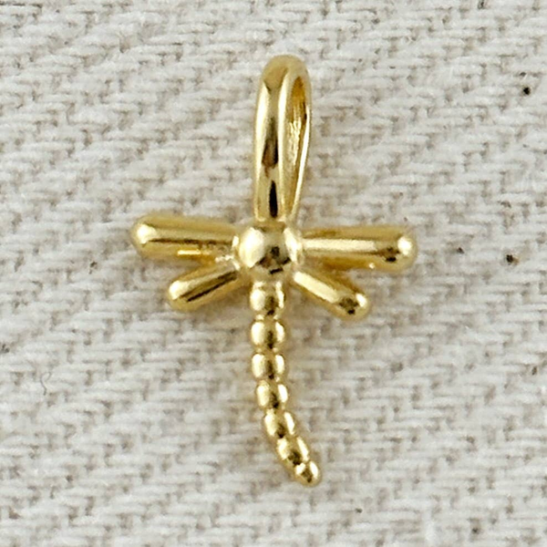 This beautifully crafted 18k gold filled dragonfly charm features intricate wing detailing and an elongated body that captures the insect's distinctiv Conti Jewelers Endwell, NY