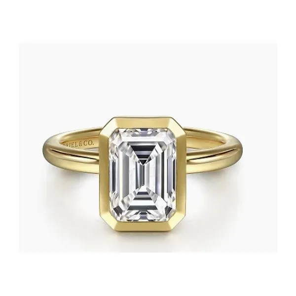 14 Karat Yellow Gold Emerald Shape Center Bezel Set with Polished Shank Engagement Ring Corinth Jewelers Corinth, MS