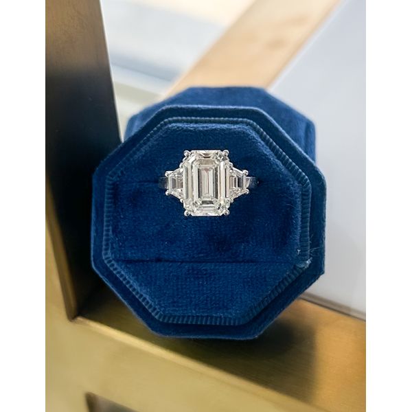 18 Karat White Gold 6.08 ct Emerald Shape Natural Diamond Center with Single Emerald Shape Accent Stones Engagement Ring - 7.10 cttw Corinth Jewelers Corinth, MS