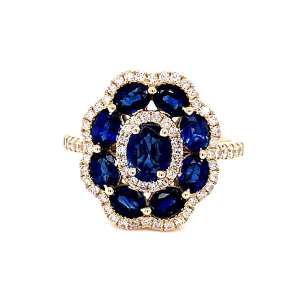 14 Karat Yellow Oval Cut Sapphires with Round Diamond Flower Halo Fashion Ring Corinth Jewelers Corinth, MS
