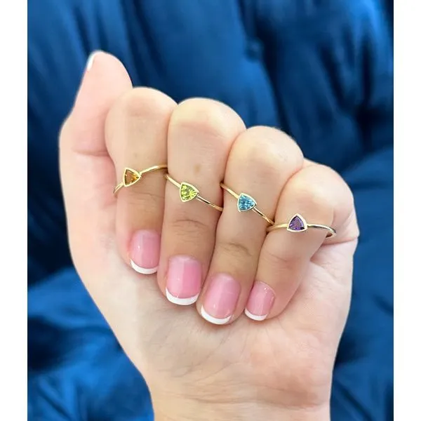 10 Karat Yellow Gold Bezel Set Trillion Shape Swiss Blue Topaz Ring - Finger Size 6.5 Image 2 Corinth Jewelers Corinth, MS