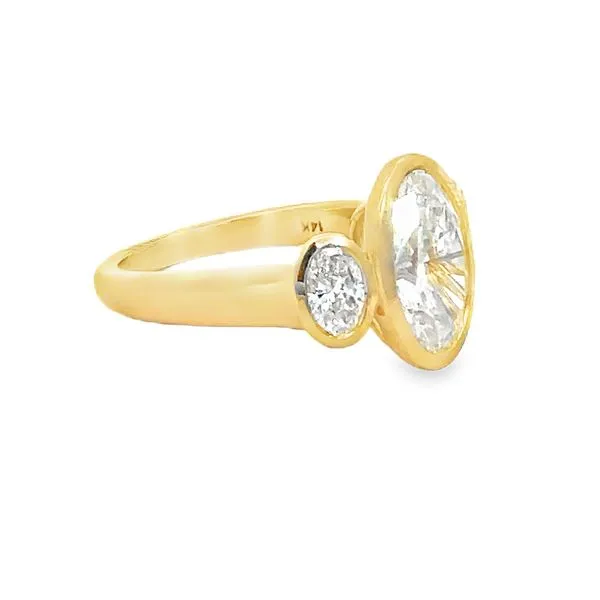 14 Karat Yellow Gold Three Stone Bezel Set Oval Shape Lab Grown Diamond Engagement Ring - 3.83 cttw Image 2 Corinth Jewelers Corinth, MS