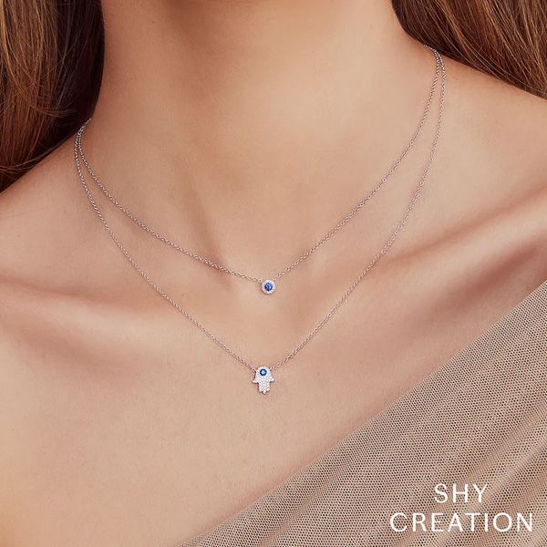 Shy Creation 14K Diamond and Blue Sapphire Halo Necklace Image 2 D. Geller & Son Jewelers Kennesaw, GA