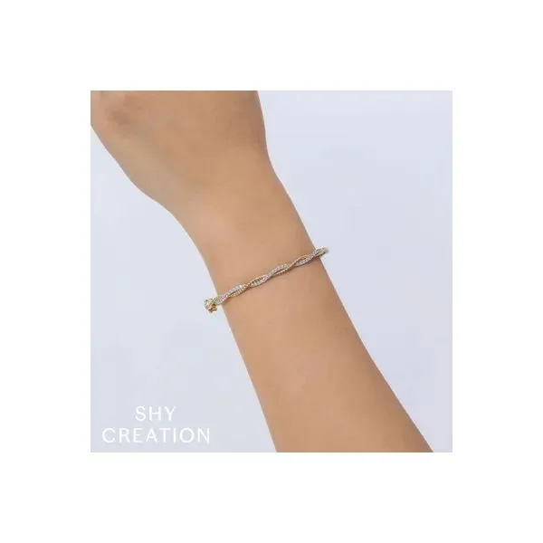Shy Creation 14K Diamond Twisted Bangle Image 2 D. Geller & Son Jewelers Kennesaw, GA