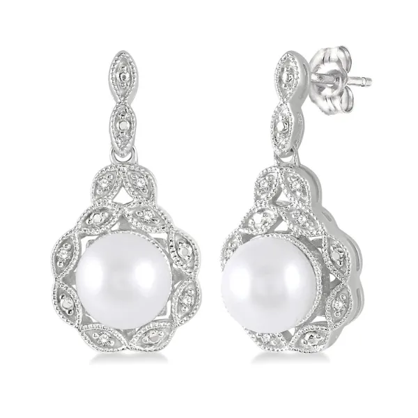 Silver diamond dangle earrings top