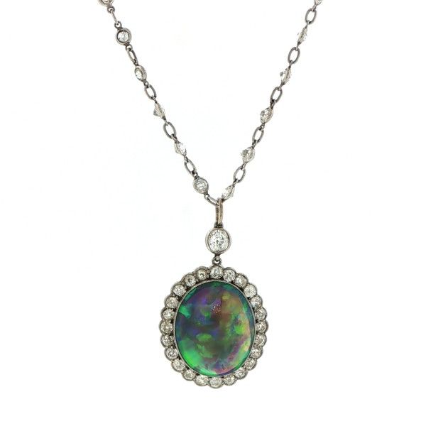 Oval Opal with Halo of Diamonds Pendant on Chain Dickinson Jewelers Dunkirk, MD
