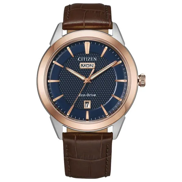 Men's Citizen Eco-Drive "Corso" Two Tone Rose & Stainless Steel Watch With Navy Dial And Brown Leather Strap Doland Jewelers, Inc. Dubuque, IA