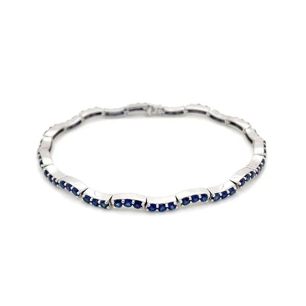 14KW Gold 3.38 CTW Blue Sapphire Wave Bracelet 7