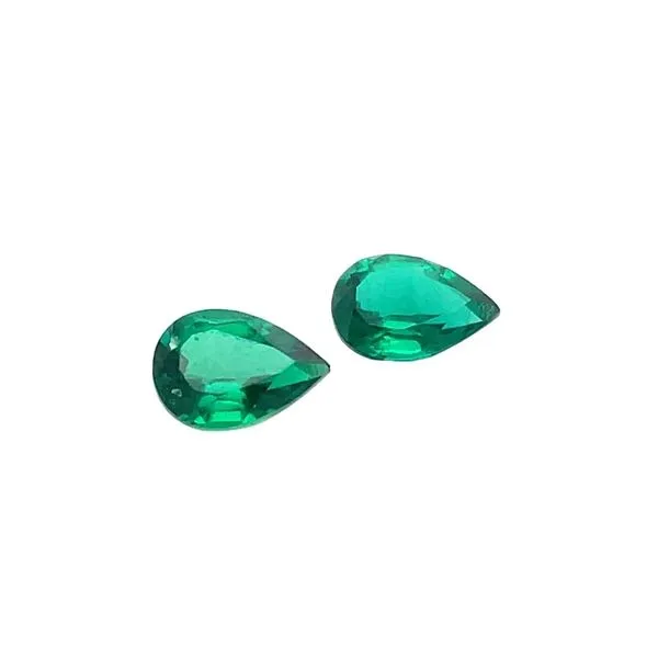 Matched Pair of 7 x 5 mm Pear Lab Grown Green Emeralds Image 2 Franzetti Jewelers Austin, TX