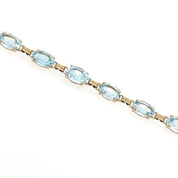 14KY Gold Natural Sky Blue Topaz Link Bracelet 7.25