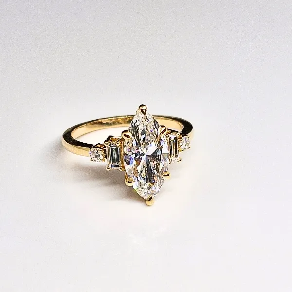 14k Yellow Gold Marquise Diamond engagment ring with accent stones Frontenac Jewellers Kingston, ON