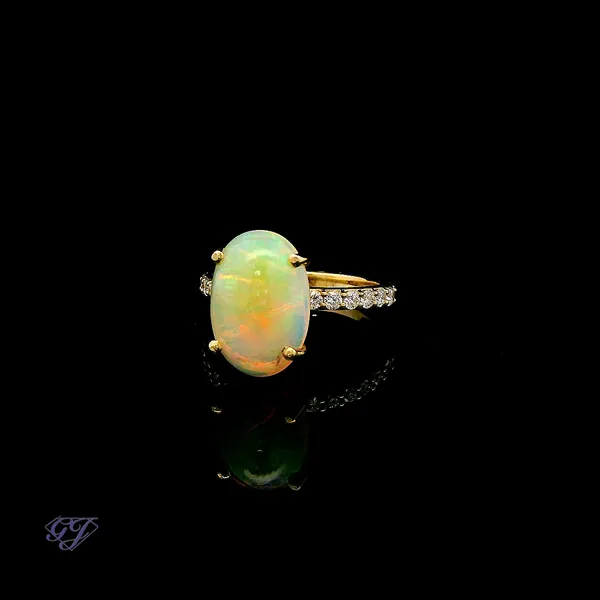 18K Yellow Gold 3.20ct Oval Ethiopian Opal Image 3 Geneva Jewelry Riverside, CA
