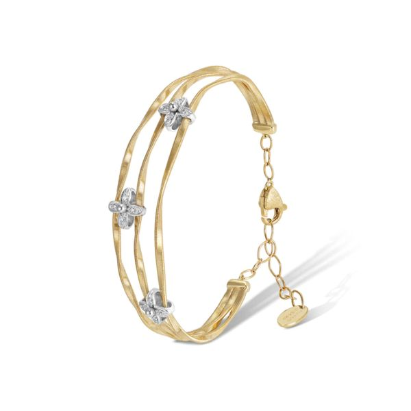 Marco Bicego® Marrakech Onde Collection 18K Yellow and White Gold Three Strand Bangle with Diamond Flowers George Press Jewelers Livingston, NJ