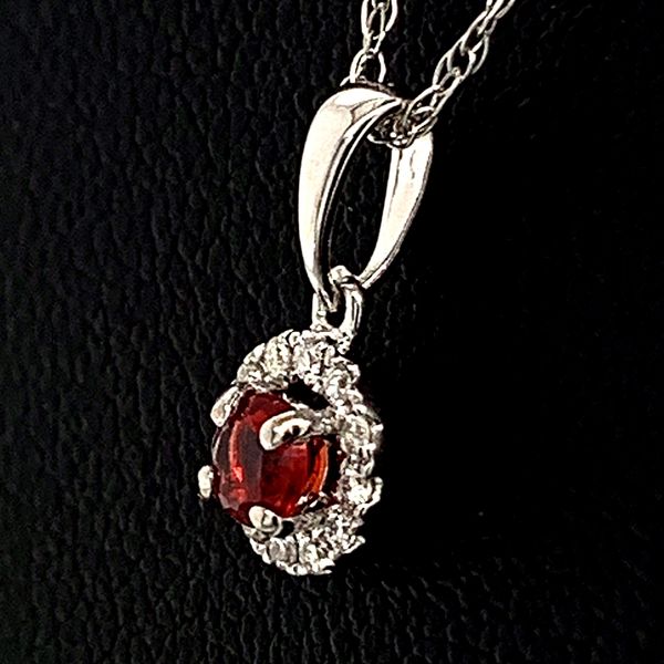 Fire Ruby and Diamond Halo Pendant Image 2 Geralds Jewelry Oak Harbor, WA