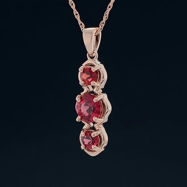 Fire Ruby 3 Stone Pendant in Rose Gold Image 2 Geralds Jewelry Oak Harbor, WA