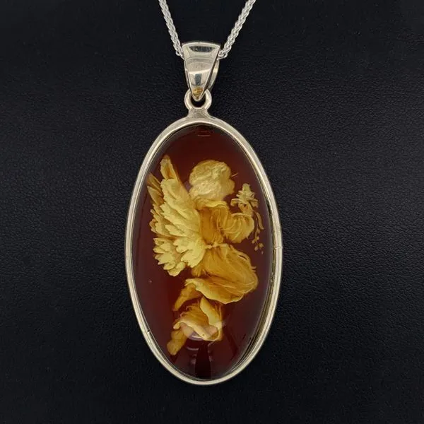 Hand Carved Amber Angel Pendant Geralds Jewelry Oak Harbor, WA