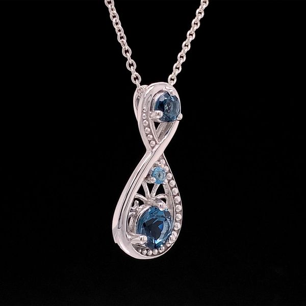 Blue Topaz Infinity Inspired Pendant Image 3 Geralds Jewelry Oak Harbor, WA