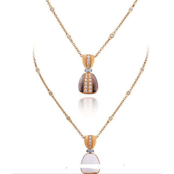 Picchiotti18Kt Yellow Gold Reversible Green Mother of Pearl and White Ceramic Pendant Graham Jewelers Wayzata, MN