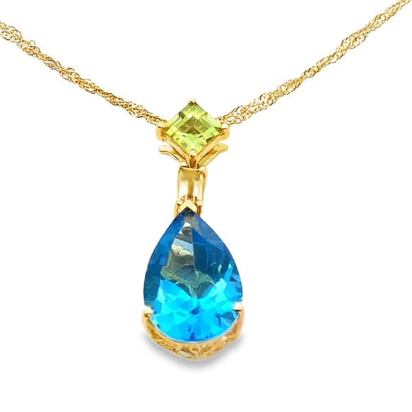 ESTATE 14ky 5.93ct sky blue topaz pendant on a 14ky double chain with a .72ctw step-cut peridot Graham Jewelers Wayzata, MN