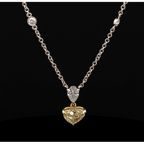 Platinum and 18K Two Tone Gold Fancy Yellow Heart Shape Diamond and Pear Shape Diamond Pendant Gray's Jewelers Bespoke Saint James, NY