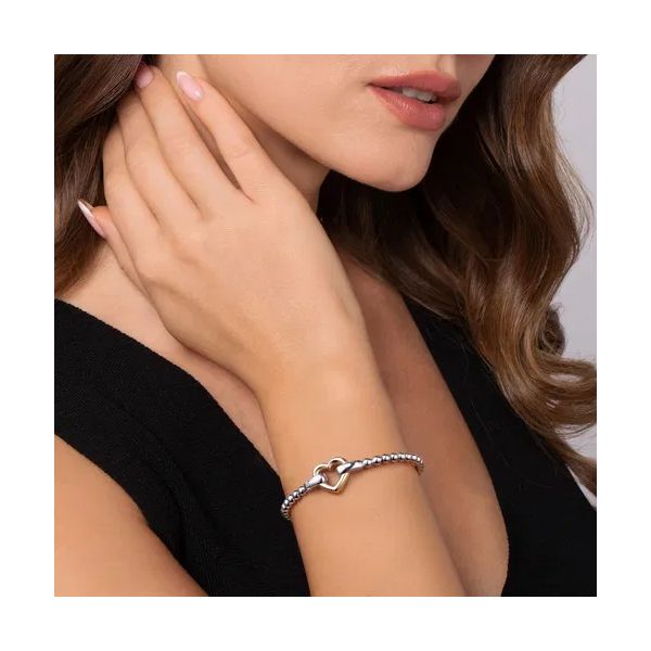 14K Yellow Gold and 925 Sterling Silver Heart Lock Bujukan Bangle Image 3 Gray's Jewelers Bespoke Saint James, NY