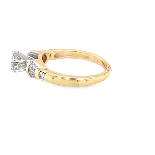 14K YG ROUND AND BAGUETTE DIAMOND ENGAGEMENT RING
