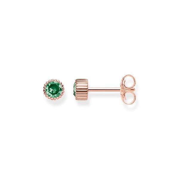 The THOMAS SABO ear studs featuring high-quality workmanship sparkle from their centre and are subtly framed by a classic bezel  Harmony Jewellers Grimsby, ON