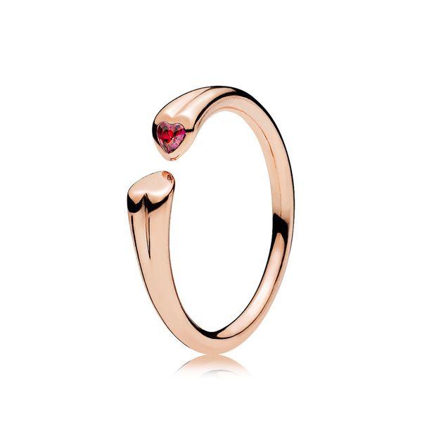 Two hearts open ring in PANDORA Rose with 1 flush-set heart-shaped step dome-cut red CZ Harmony Jewellers Grimsby, ON