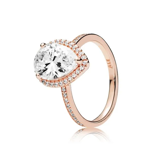 Ring in Rose with 1 claw-set pear-cut CZ and 46 bead-set clear CZ Harmony Jewellers Grimsby, ON