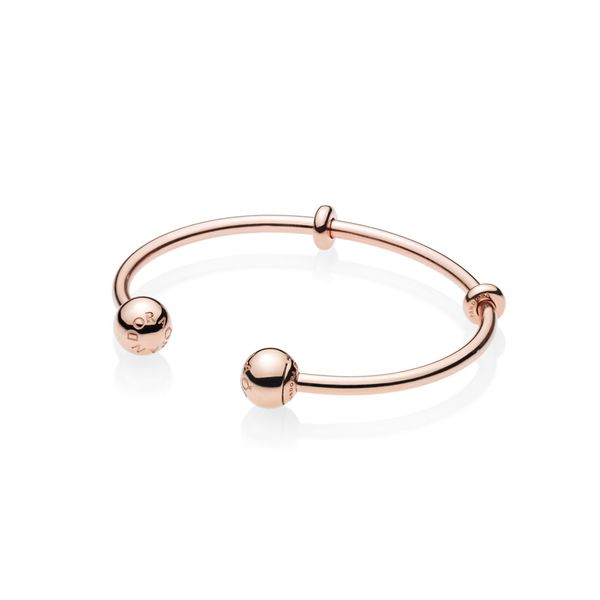 Open bangle in Rose with silicone stoppers and interchangeable end caps Harmony Jewellers Grimsby, ON