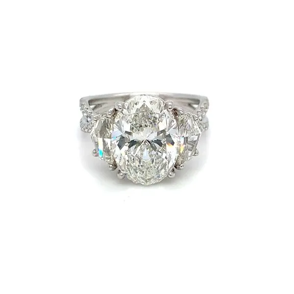 Three-Stone Oval and Cadillac Diamond Ring Hingham Jewelers Hingham, MA