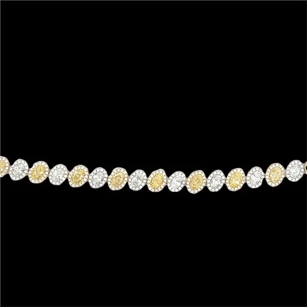 Fancy Yellow and White Diamond Halo Tennis Bracelet Hogan's Jewelers Gaylord, MI