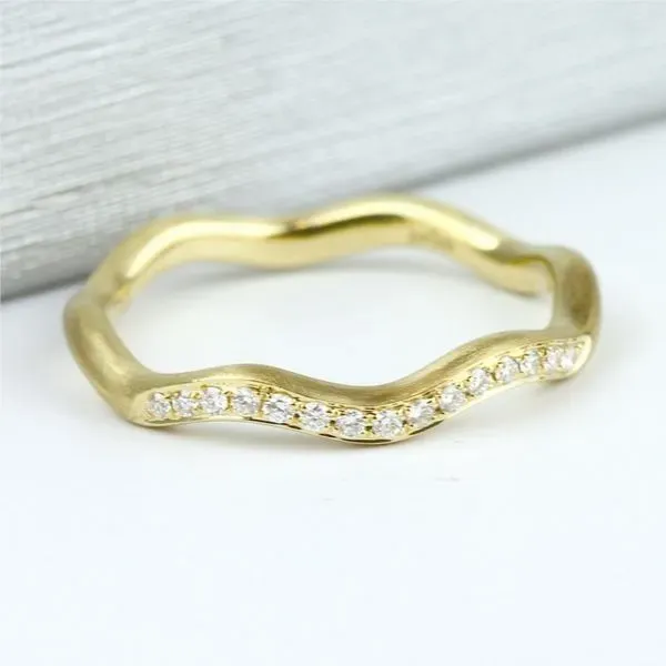 Beautifully satin finished diamond wave design band. Holliday Jewelry Klamath Falls, OR