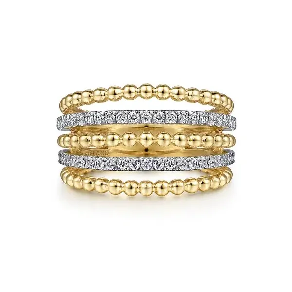 Stylish gold and diamond ring that appears to be stacked but it one ring by Gabriel & Co Holliday Jewelry Klamath Falls, OR