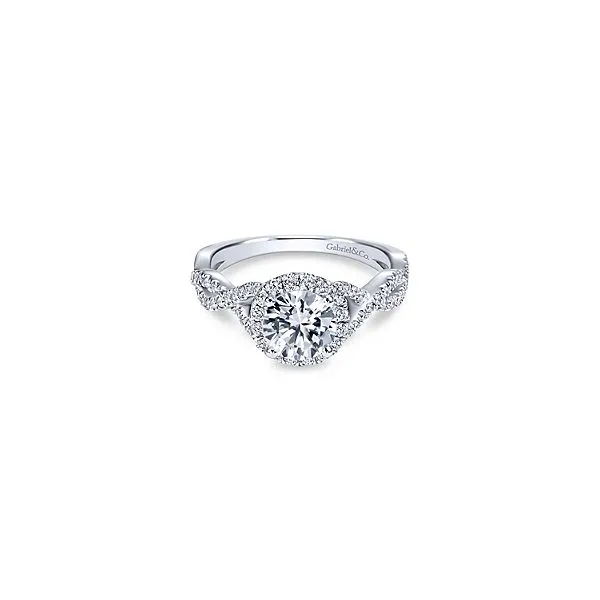 This Gabriel & Co. Diamond Engagement Ring Features a Halo and Twist Shank. *Center Stone Not Included Holliday Jewelry Klamath Falls, OR