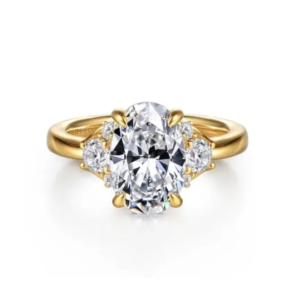 Stunning oval diamond ring set in yellow gold. *Center not included. Holliday Jewelry Klamath Falls, OR