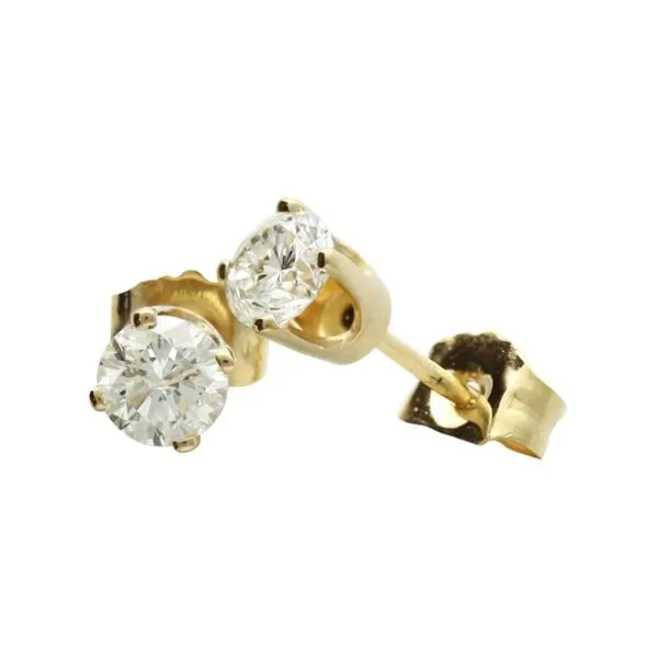 Solitaire diamond earrings in yellow gold. Holliday Jewelry Klamath Falls, OR