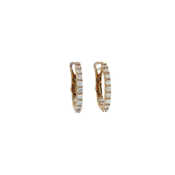 Sophisticated in and out oval diamond hoop earrings. Holliday Jewelry Klamath Falls, OR