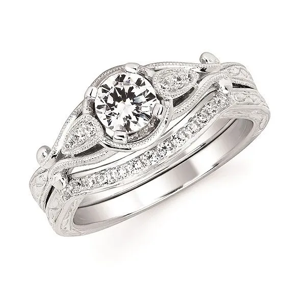 Vintage inspired wedding set with engraved detail. *Center not included Holliday Jewelry Klamath Falls, OR
