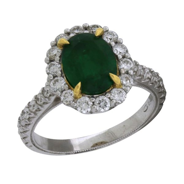 Halo design emerald ring. Holliday Jewelry Klamath Falls, OR