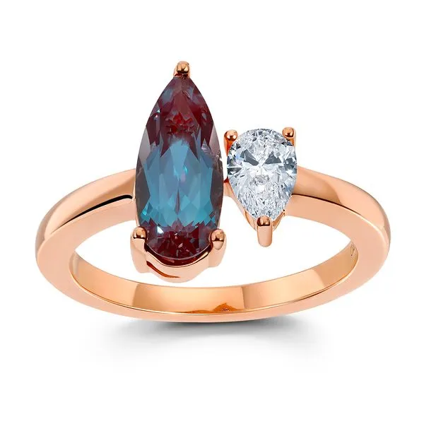 Modern two-stone ring featured in rose gold with Chatham created Alexandrite and laboratory grown diamond. Holliday Jewelry Klamath Falls, OR