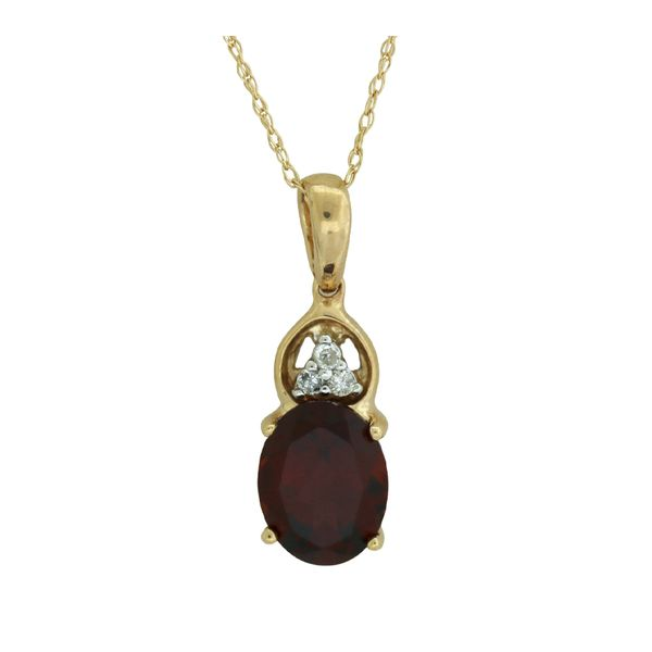 Traditional garnet and diamond pendant. Holliday Jewelry Klamath Falls, OR