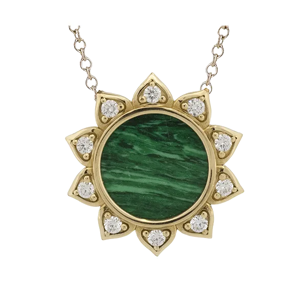 Wonderful Malachite pendant that gives a flare to the sun. Holliday Jewelry Klamath Falls, OR