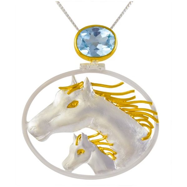 Horse lover's dream Blue topaz,Sterling Silver, and 22K Vermeil pendant. Holliday Jewelry Klamath Falls, OR