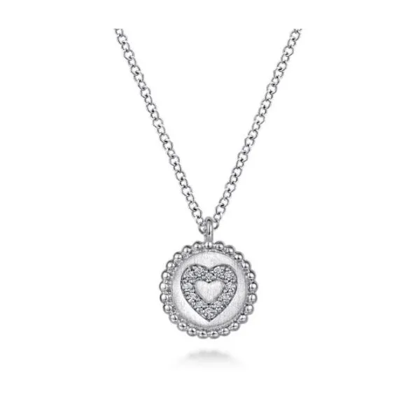 Shimmering sterling silver and diamond heart pendant. Holliday Jewelry Klamath Falls, OR