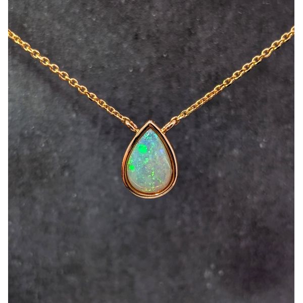 White Australian Opal Pendant in 14K Gold Image 2 Holly McHone Jewelers Astoria, OR