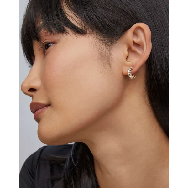 Cailin Gold Crystal Huggie Earrings in White Crystal by Kendra Scott Image 3 House of Silva Wooster, OH