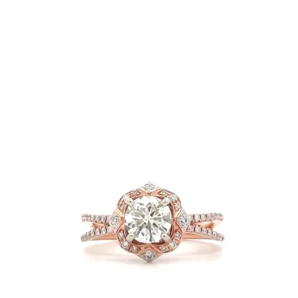Make a statement with this modern 14k Rose Gold Diamond Engagement Ring. The open shank design and two-tone halo concept create a unique look. The center diamond is a 0.73ct round brilliant J/SI2, surrounded by 0.23cttw round brilliant diamonds along the  Hudson Valley Goldsmith New Paltz, NY