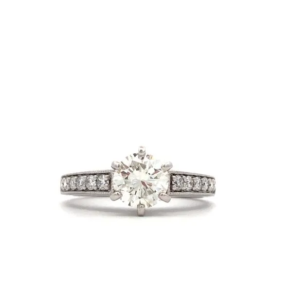 This 14K white gold diamond mounting features a 1.12ct round brilliant J/SI2 6.69mm GIA#2213482542 center stone. The mounting has a total carat weight of 0.38ctw and is accented with milgrain designs. It is the perfect choice for an engagement ring. Hudson Valley Goldsmith New Paltz, NY